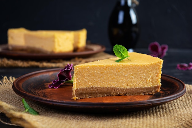 Homemade cheesecake with pumpkin Slice of delicious cake with pumpkin