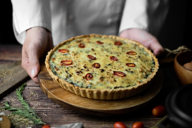 Homemade cheesy spinach quiche for brunch