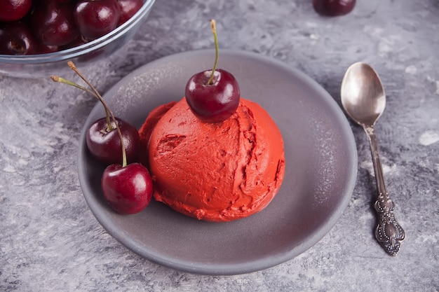 Homemade cherry ice cream on the table