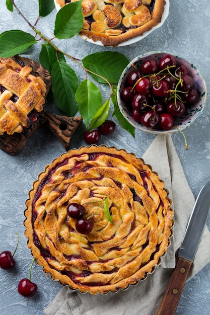 Homemade cherry pie with cherry fruits in a bowl