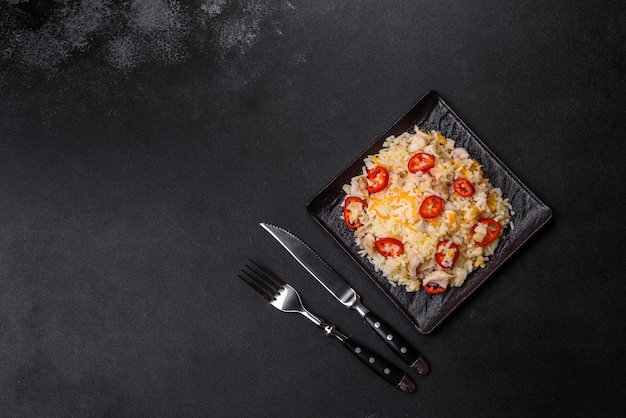 Homemade chinese fried rice with vegetables and a chicken