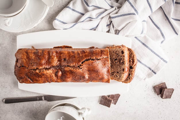 Photo homemade chocolate bread (cake) on a white background.