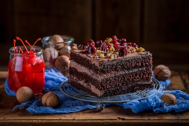 Homemade chocolate cake made of cherries and walnuts