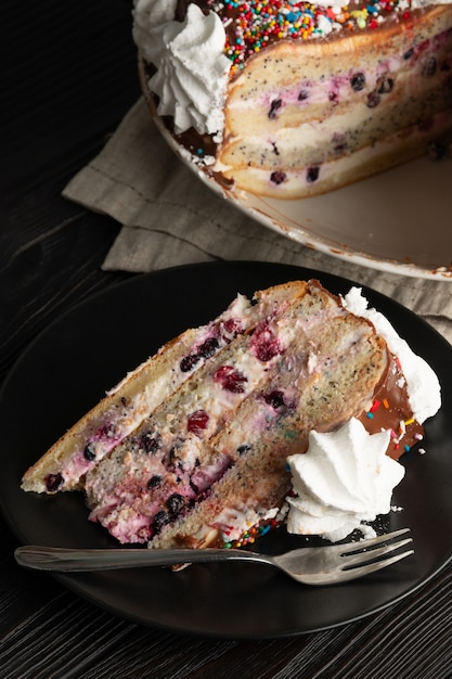 Homemade chocolate cake on wooden background