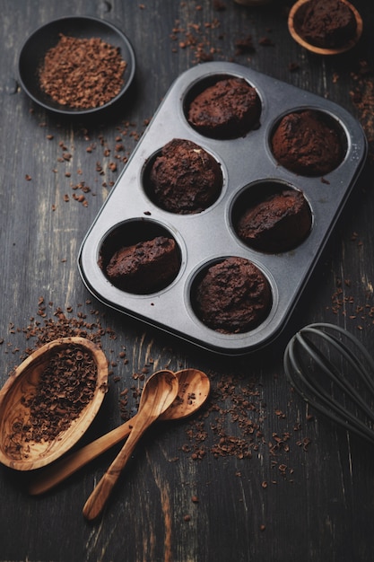 Homemade chocolate muffins with chocolate topping, delish and simple dessert. 