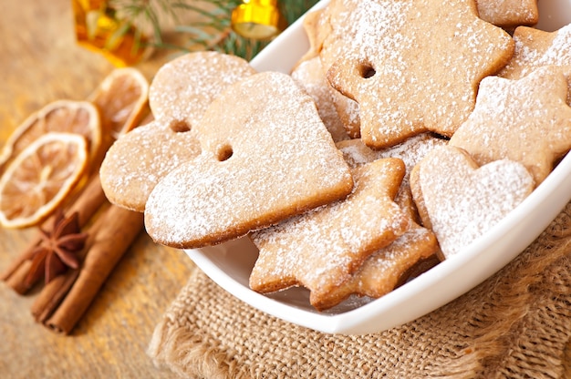 Homemade Christmas cookies sprinkled with powdered sugar