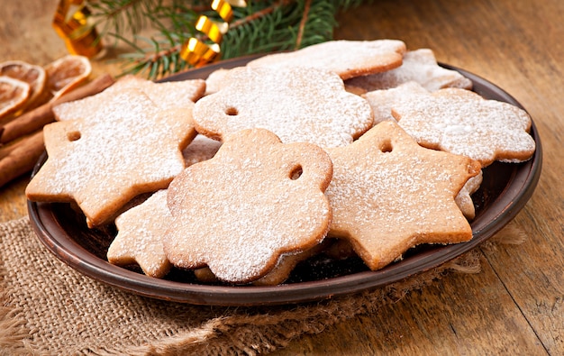 Homemade Christmas cookies sprinkled with powdered sugar