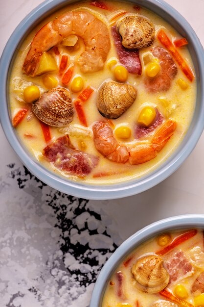 Homemade clam chowder with shrimps.