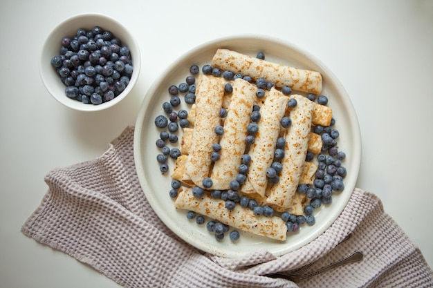 Homemade classic pancakeshealthy summer breakfast with fresh berryes morning lightcopy space view