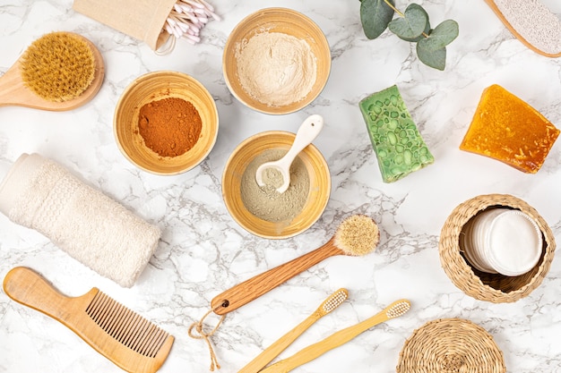 Homemade clay facial mask. Zero waste eco friendly diy beauty products ingredients on light wall, flat lay, top view