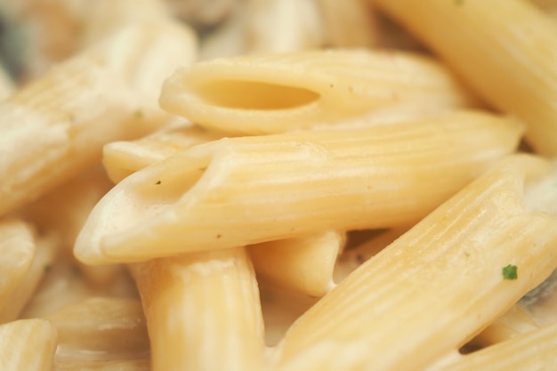 homemade cooked pasta in a plate on table