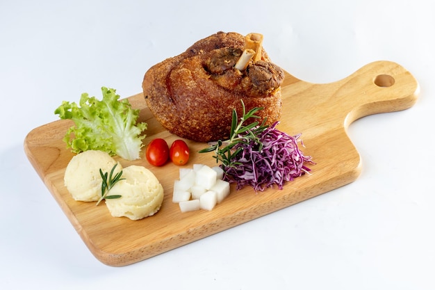 Homemade Crispy Golden Deep Fried Pork Knuckle isolated on a white background Clipping path