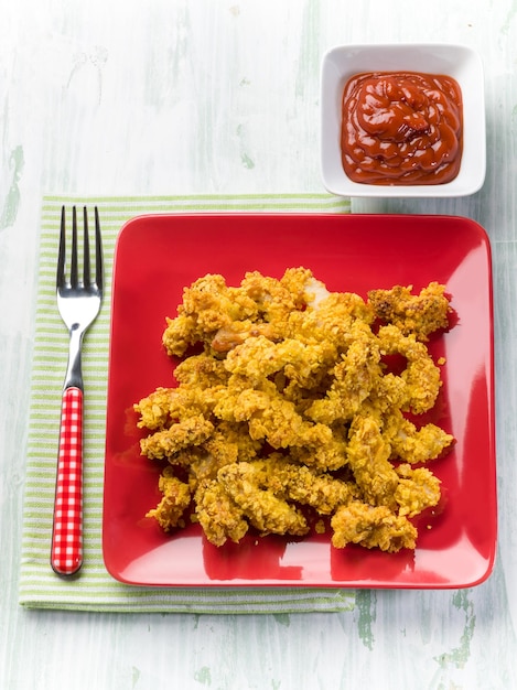 Homemade croquette with ketchup