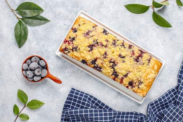 Homemade delicious blueberry crumble cake with frozen blueberries,top view