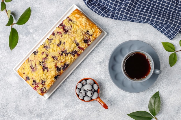 Homemade delicious blueberry crumble cake with frozen blueberries,top view