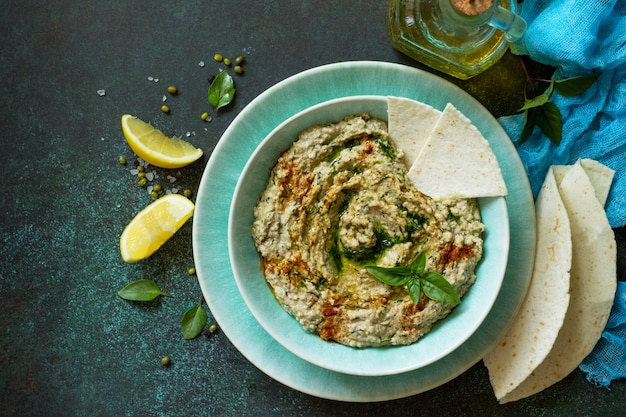 Homemade delicious and healthy protein vegan Ramadan food Hummus with mung and tahini Top view