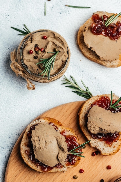 Homemade duck liver pate with red onion jam Gourmet appetizers Assorted Italian appetizer bruschetta