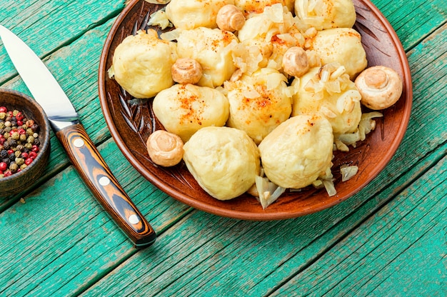 Homemade dumplings with mushrooms.