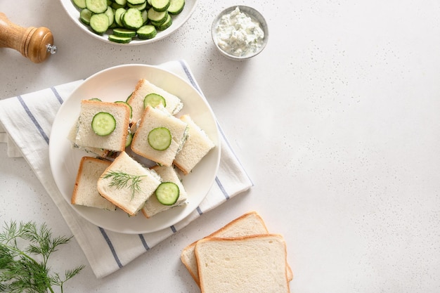 Homemade English tea cucumber sandwiches with ricotta and dill