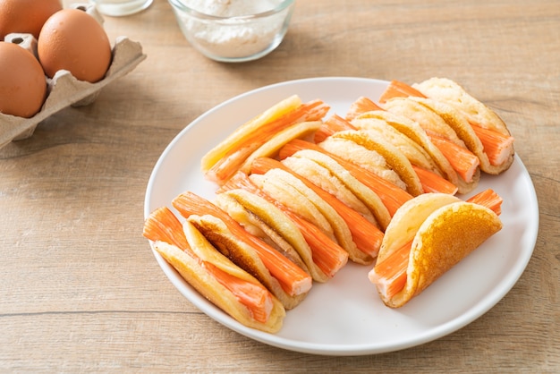 homemade flat pancake roll with crab stick