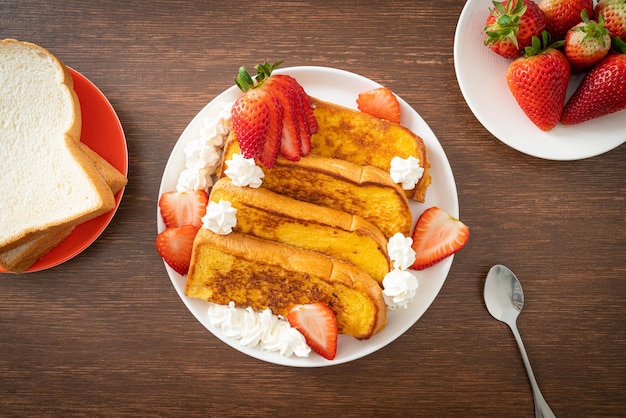 homemade french toast with fresh strawberry and whipping cream