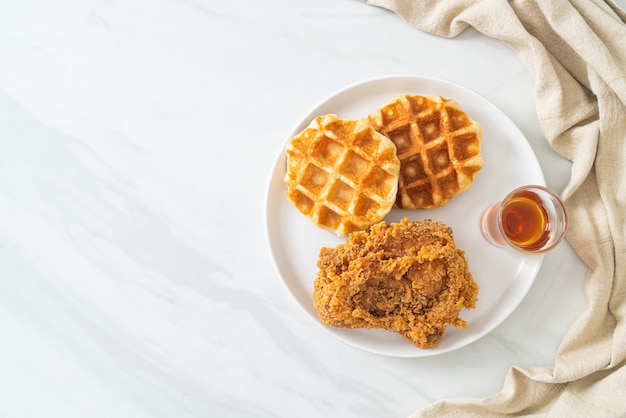 homemade fried chicken waffle with honey or maple syrup