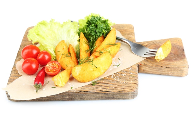 Homemade fried potato on wooden cutting board isolated on white