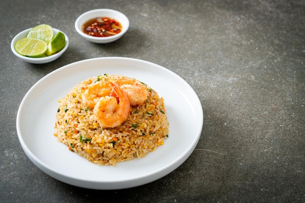 Homemade fried shrimps fried rice on plate in Thai style Asian food style