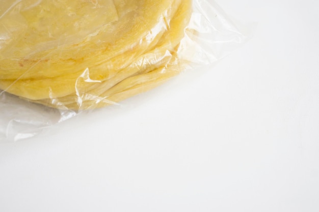 Homemade frozen food maryam bread packaged in plastic for sale in the market