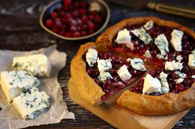 Homemade galette with cranberries and blue cheese