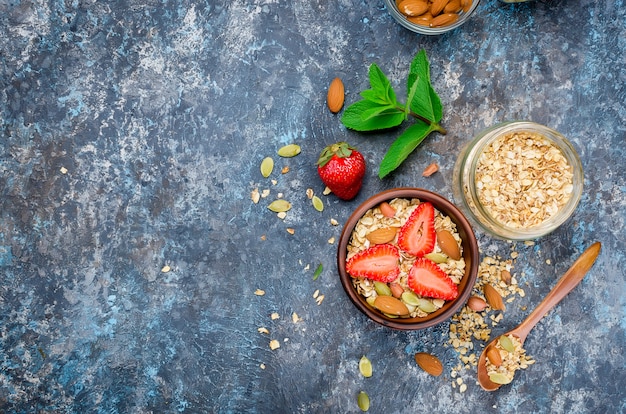 Homemade  granola with fresh strawberries 