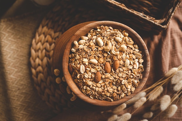 Homemade granola in wooden bowl