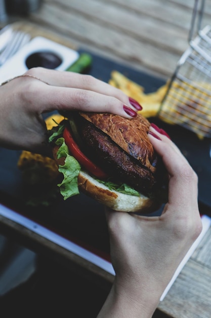 Homemade hamburger with fresh vegetables