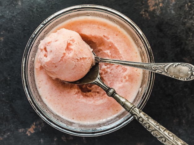 Homemade ice cream and ripe juicy peaches