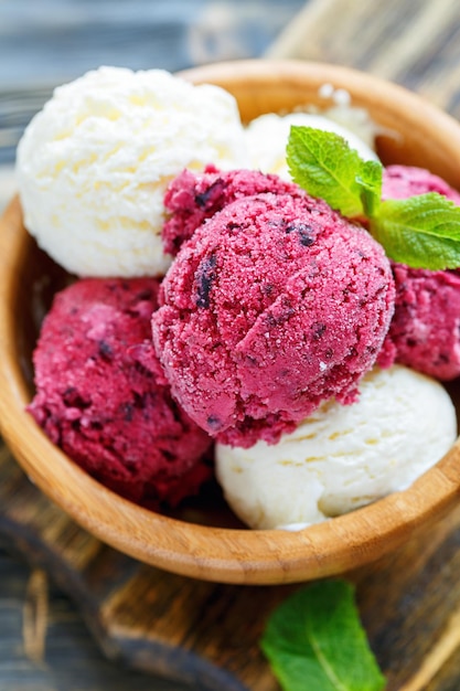 Homemade lemon and blackcurrant ice cream in a bowl