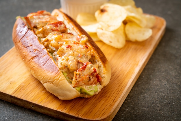 homemade lobster roll with potato chips