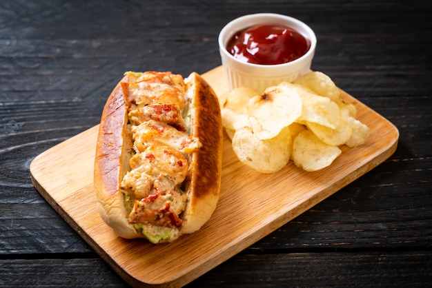 homemade lobster roll with potato chips