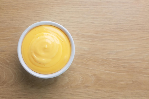 Homemade mayonnaise prepared with eggs and oil, top view