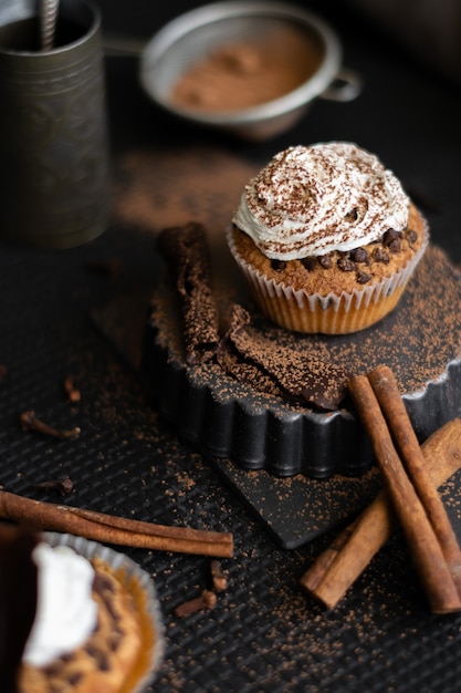 Homemade muffins with coffee and cinnamon