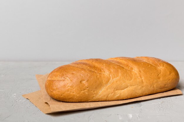 Homemade natural breads Different kinds of fresh bread as background perspective view with copy space