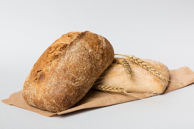 Homemade natural breads Different kinds of fresh bread as background perspective view with copy space