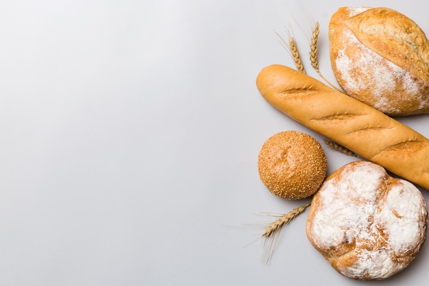 Homemade natural breads Different kinds of fresh bread as background top view with copy space