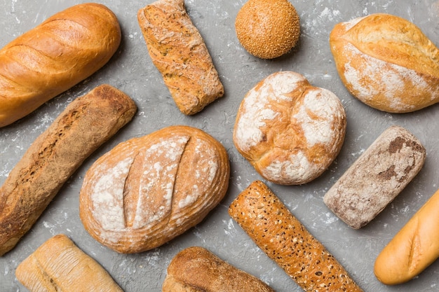 Homemade natural breads Different kinds of fresh bread as background top view with copy space