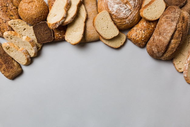 Homemade natural breads Different kinds of fresh bread as background top view with copy space