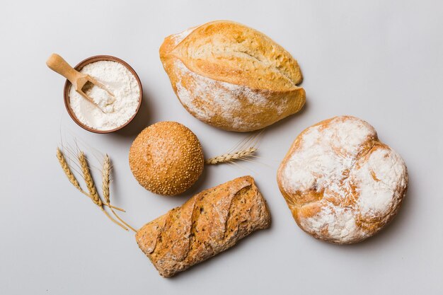 Homemade natural breads Different kinds of fresh bread as background top view with copy space