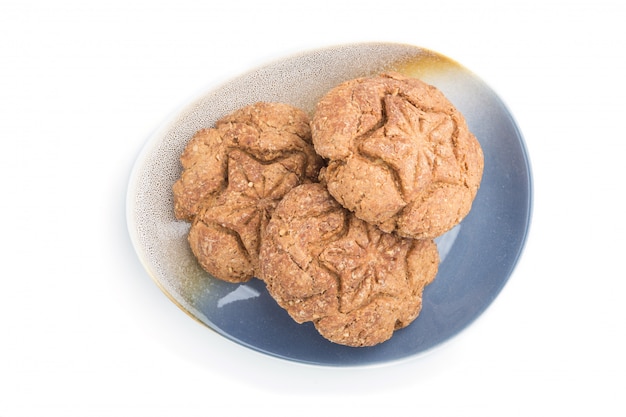 Homemade oatmeal cookies isolated on white background. top view, close up