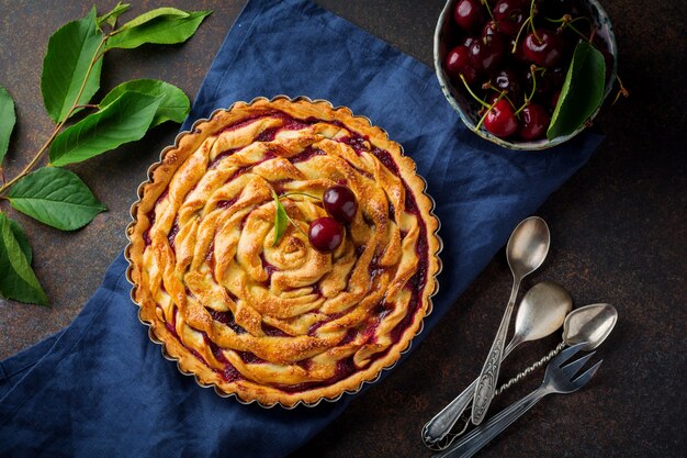 Homemade open cherry pie with lattice