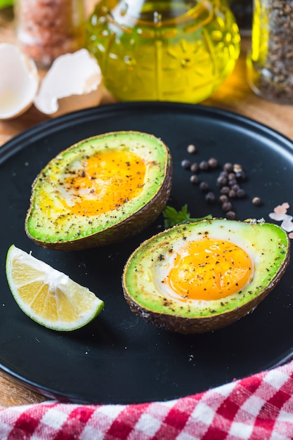 Homemade Organic Egg Baked in Avocado with Salt and Pepper