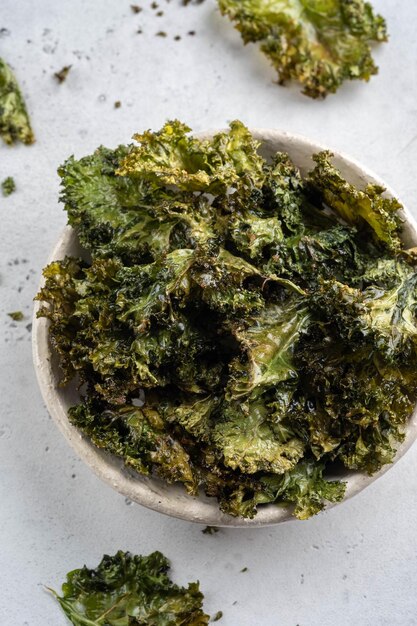 Homemade Organic Green Kale Chips with salt and oil Super food kale leaves