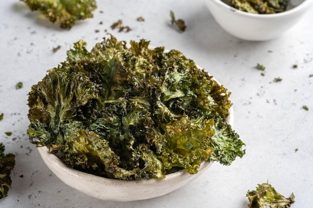 Homemade Organic Green Kale Chips with salt and oil Super food kale leaves